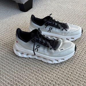 On Running Cloud Tech Phase Women's Sneakers in White and Black, gray.